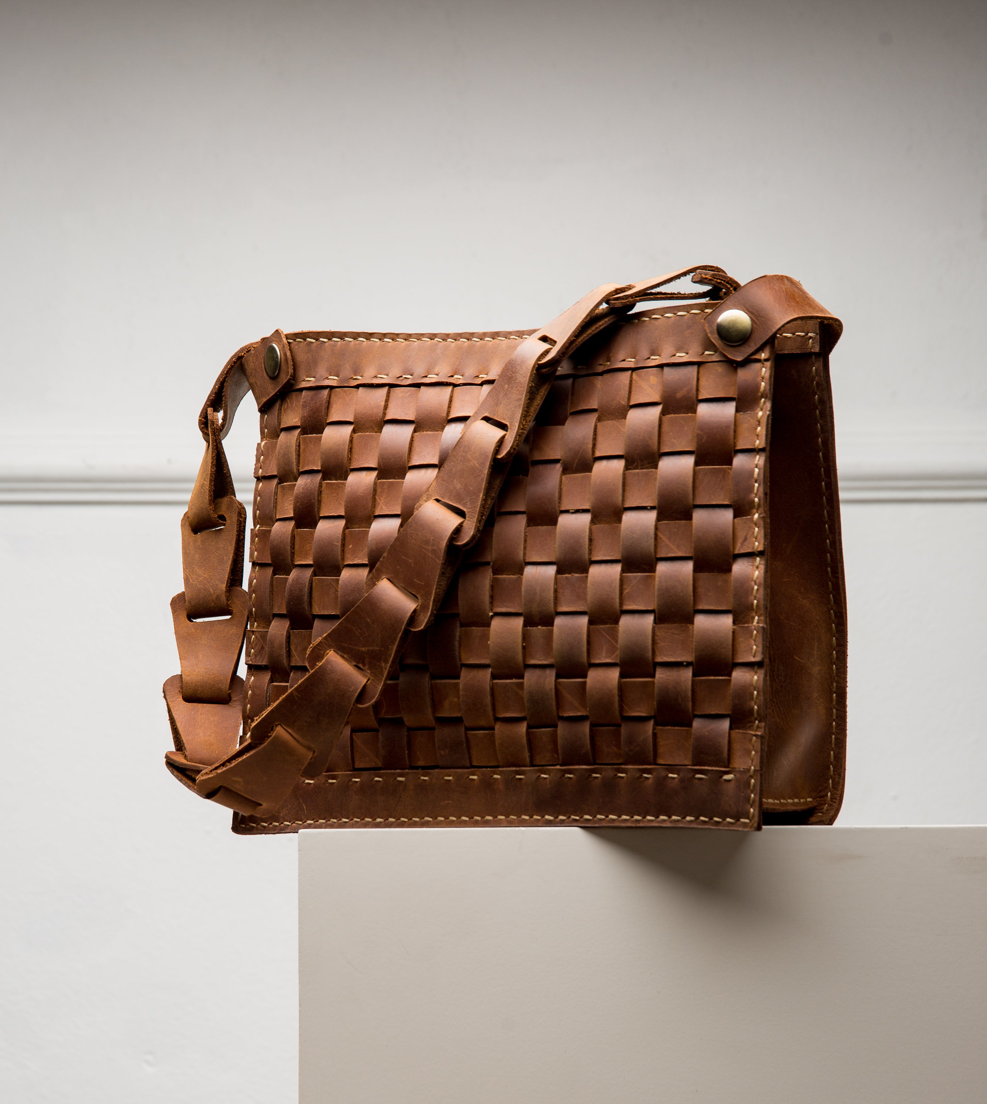 Lionell Braided Shoulder Bag - Cover image for The Woven Collection. Handmade genuine leather with an intricate woven design.