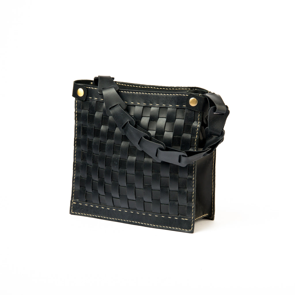 Front view of Lionell black braided leather shoulder bag. Handwoven with a perfect, intricate design.