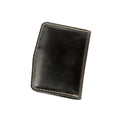 Closed view of Lionell handmade vintage leather passport holder in black