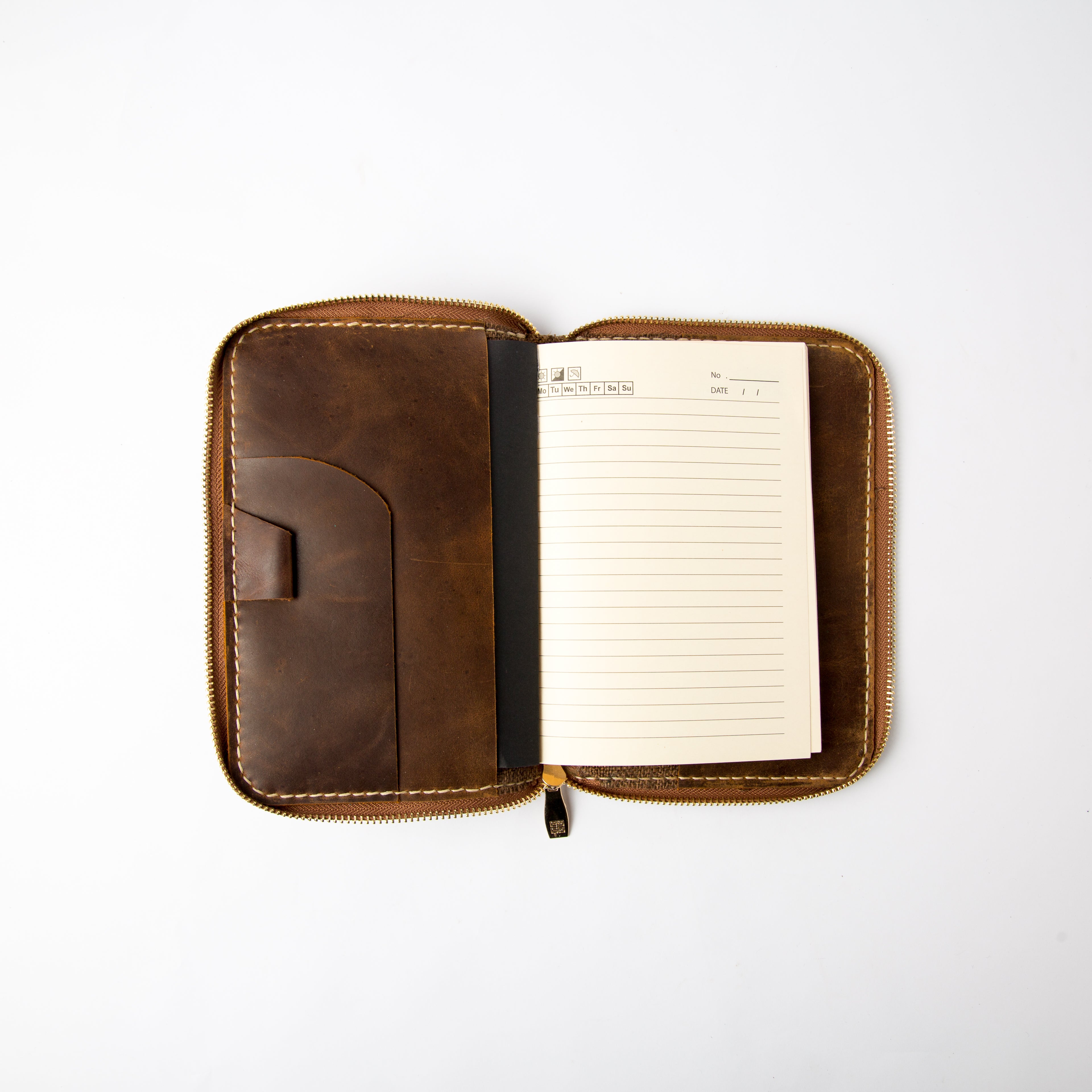 Front view of dark brown refillable leather journal cover with zipper and card slots - Lionell.