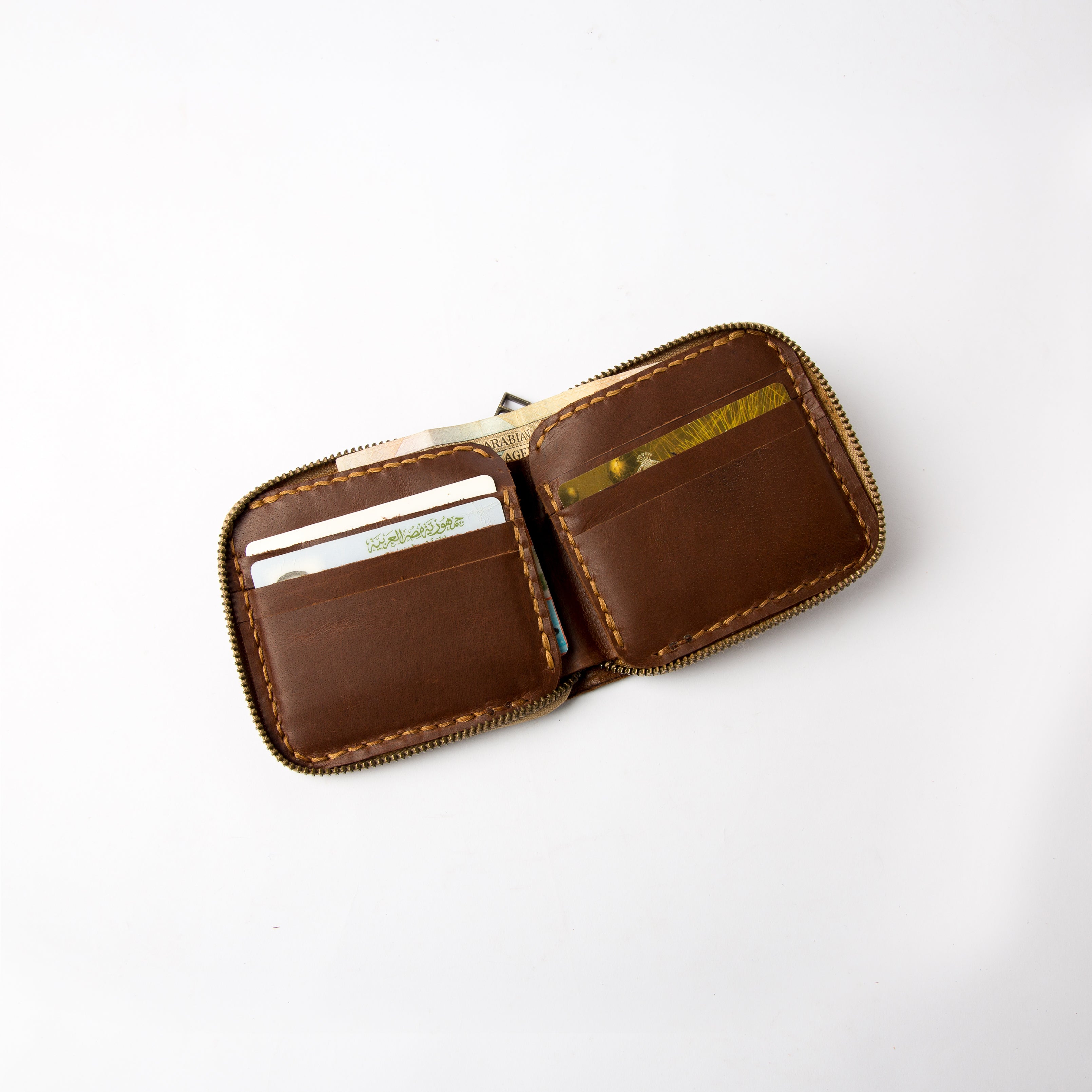 Open view of Secure zip-around handmade leather chestnut wallet- Lionell.