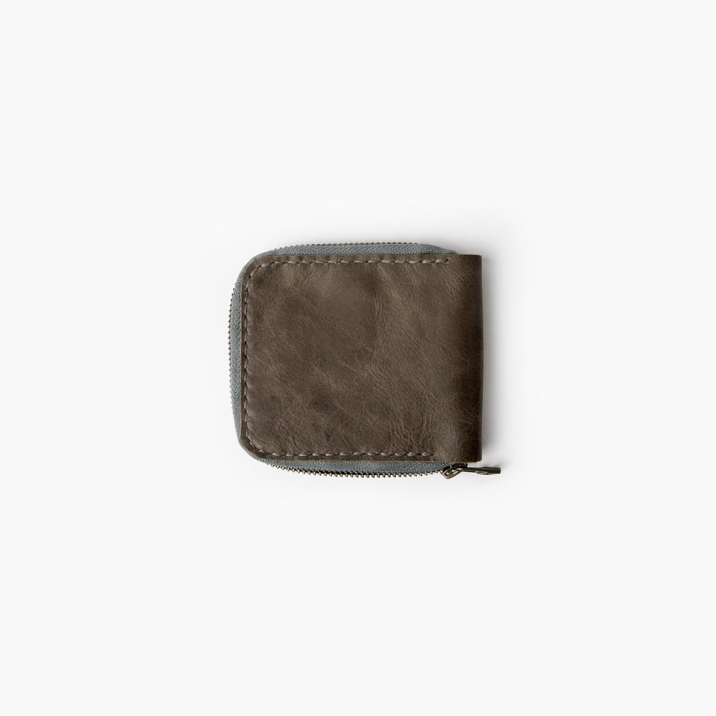 Closed view of Secure zip-around handmade leather grey wallet- Lionell.