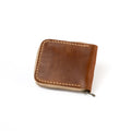 Lionell fully zippered leather wallet. Durable handmade Egyptian craftsmanship with safe design closed view.