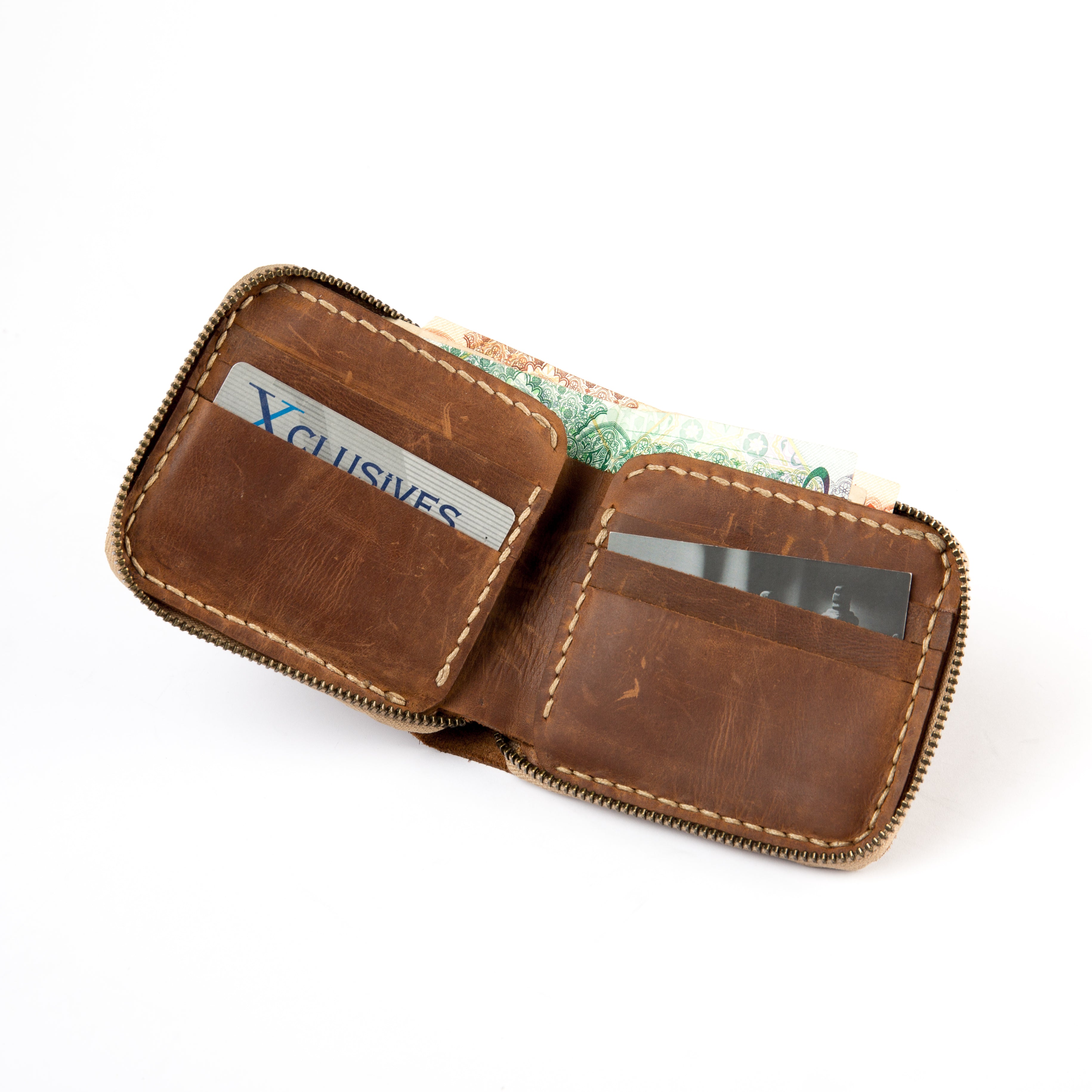 Lionell fully zippered leather wallet. Durable handmade Egyptian craftsmanship with safe design.