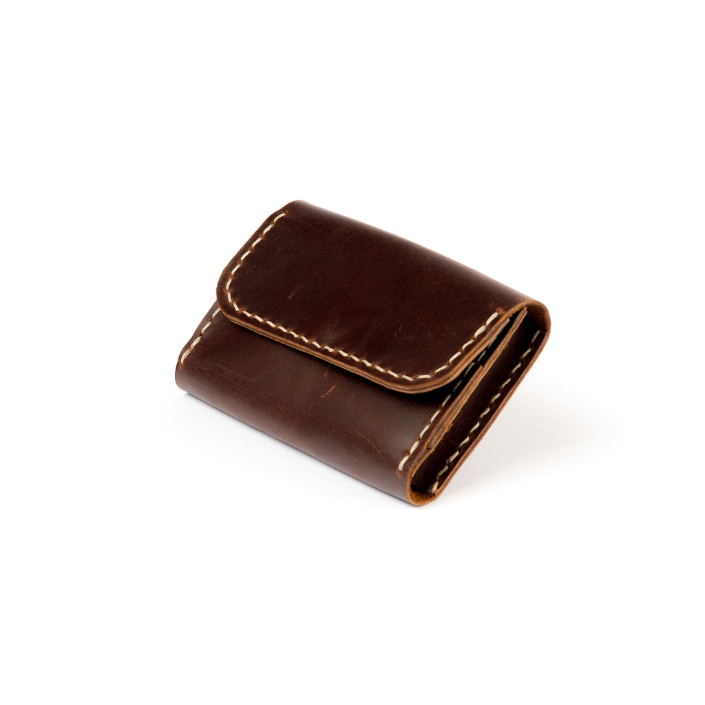 Closed view of Lionell handmade compact leather wallet in chestnut color