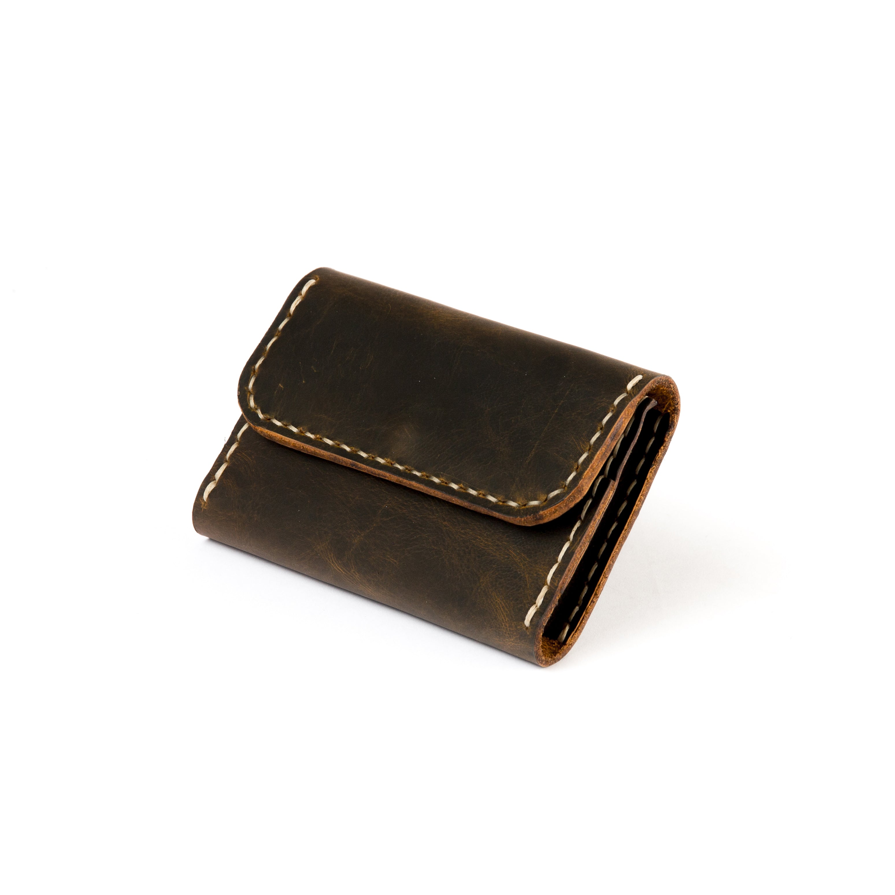 Closed view of Lionell handmade compact leather wallet in golden dust color
