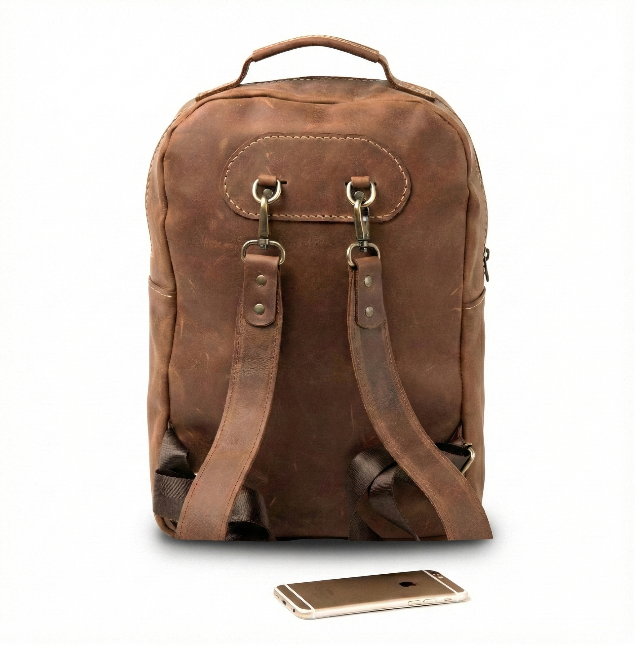 Back view of Lionell "The Heritage Pack" leather backpack showing adjustable shoulder straps and durable hardware.