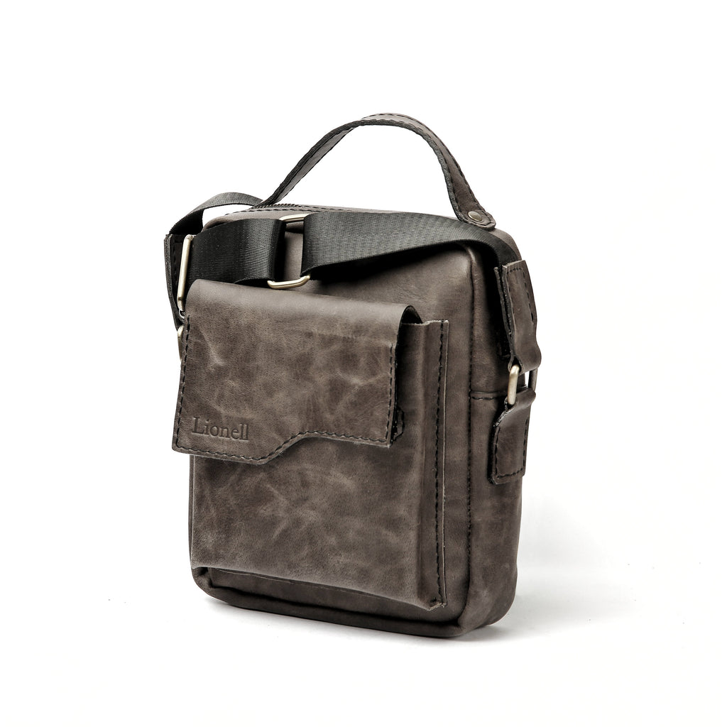 Front view of Lionell men's crossbody bag in vintage grey leather. Features a flap pocket and top handle.