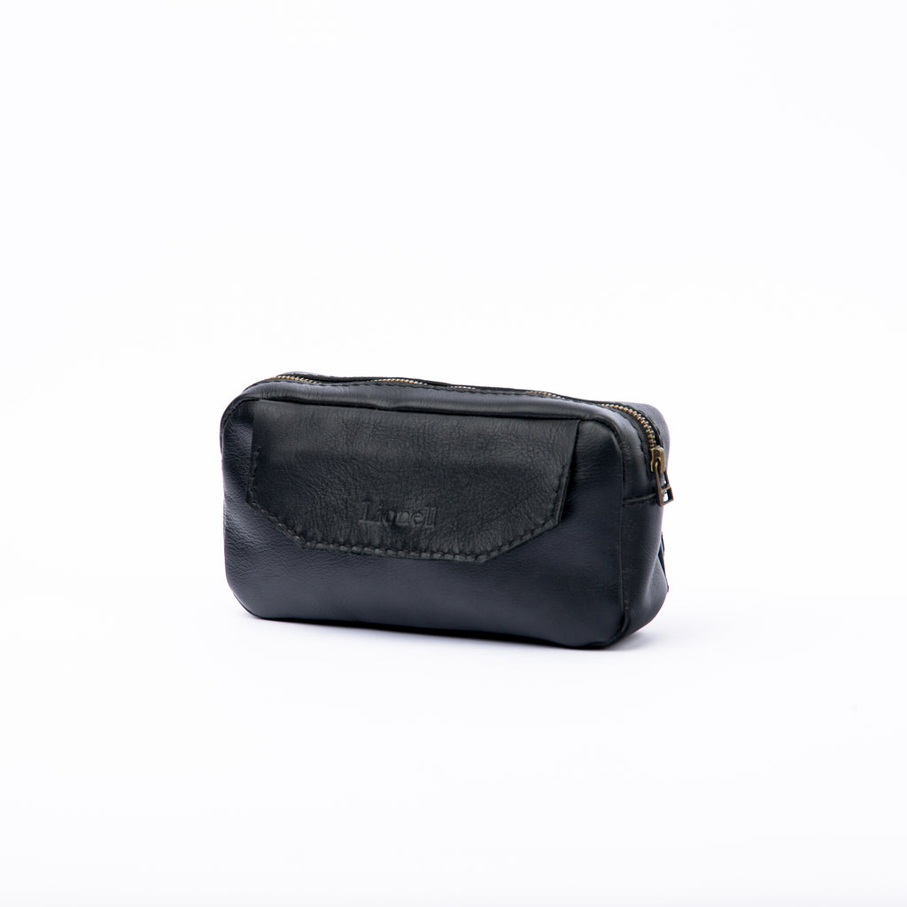 Front view of a LIONELL 'Noir' small leather handbag; handcrafted from premium black genuine leather with a soft vintage design, featuring a front flap and a sturdy top zipper, displayed on a clean white background.