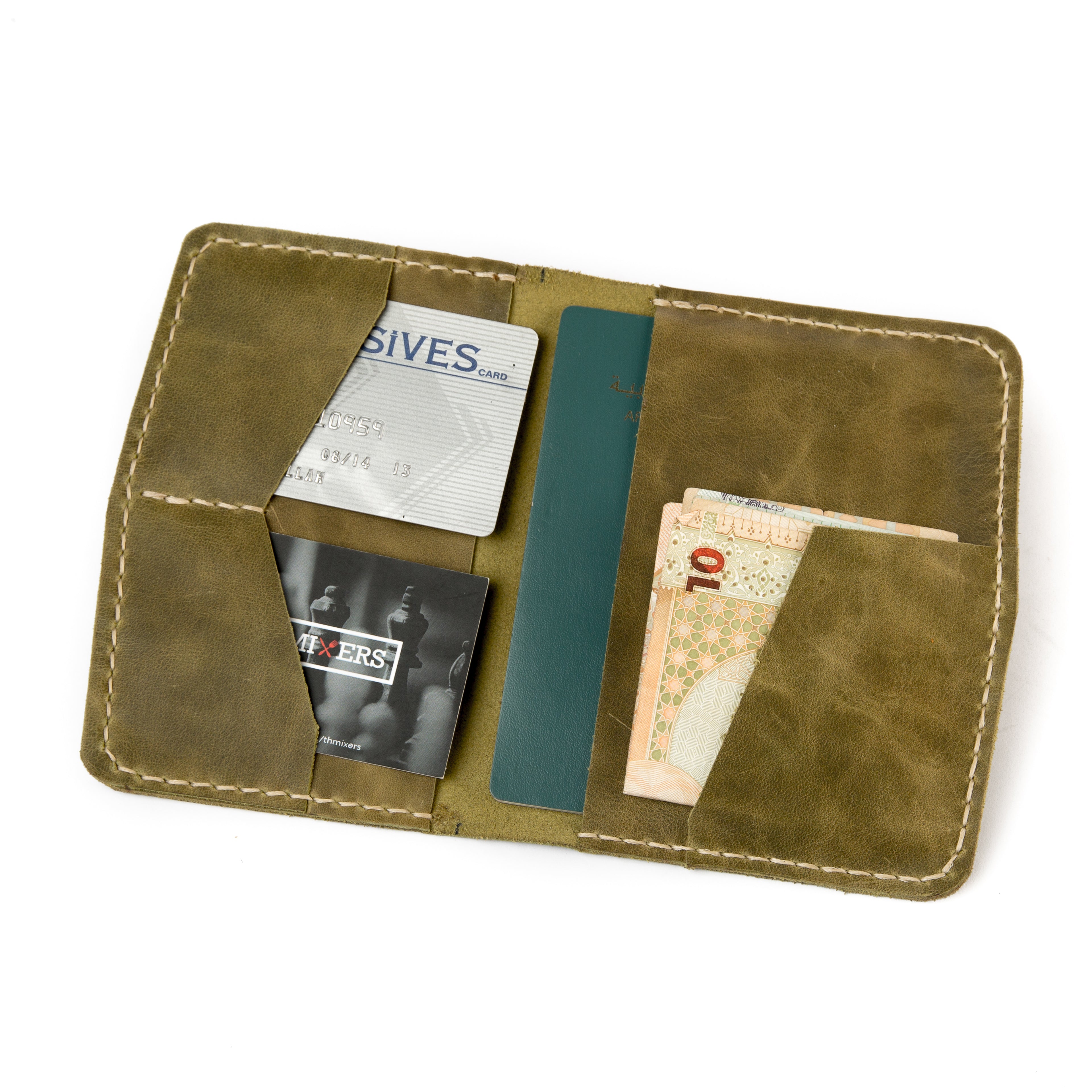Open view of Lionell handmade vintage leather passport holder in olive