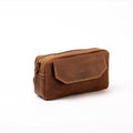 Front view of a LIONELL handcrafted small vintage brown leather handbag, featuring the brand logo on the front flap with visible decorative stitching and a sturdy top zipper.